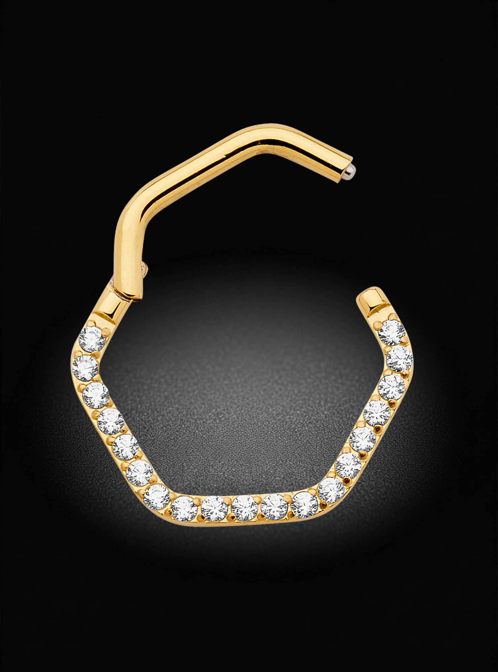 A gold-plated hexagonal hoop piercing stud adorned with clear pavé-set cubic zirconia stones, shown on a black background.