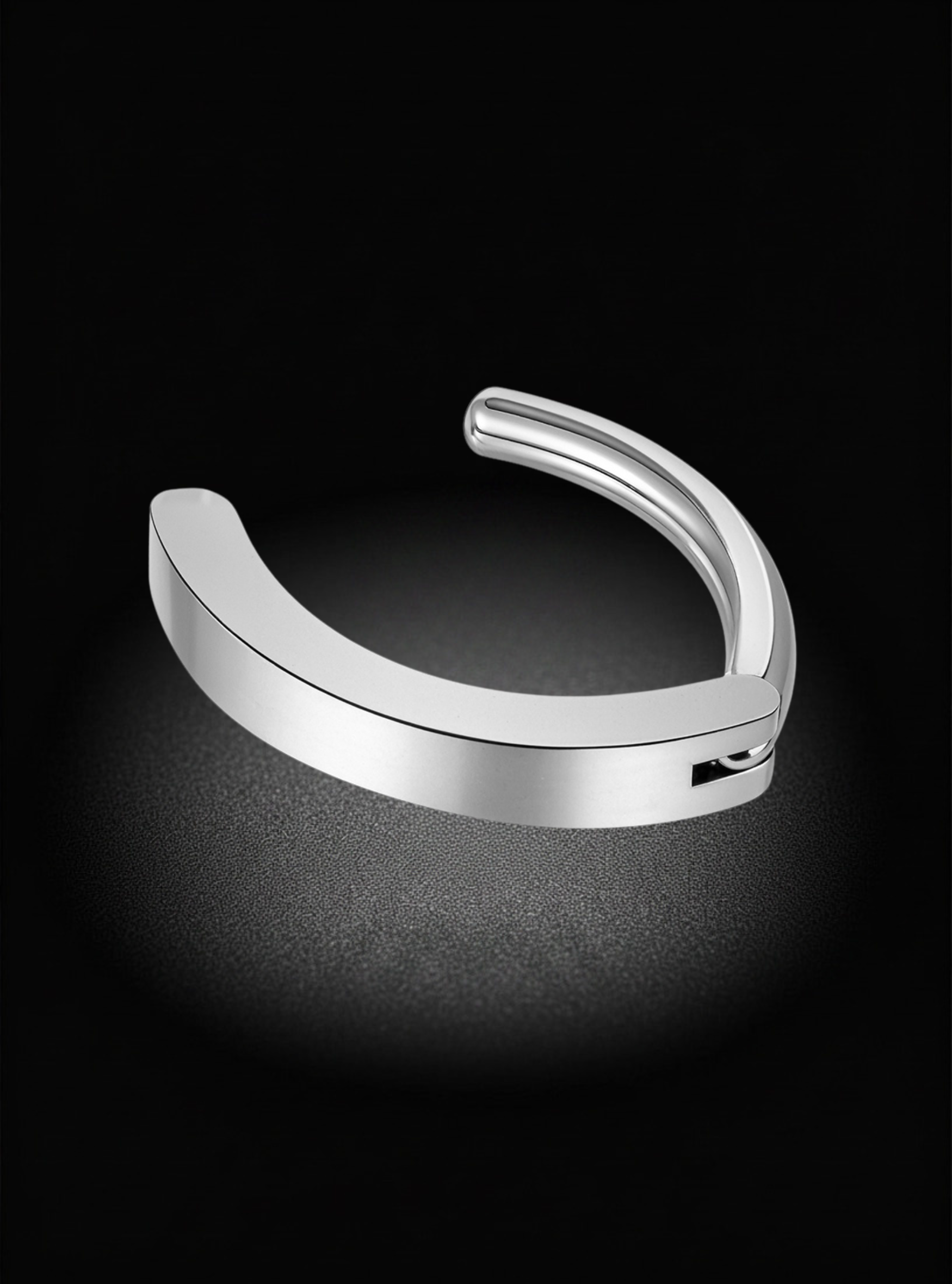 an open titanium hinged clicker belly bar