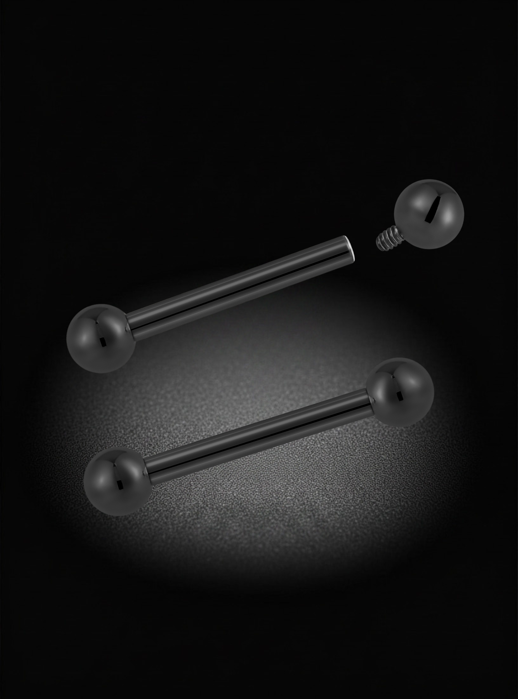 Two black titanium straight barbells piercings with spherical ball ends and a screw-back style post, displayed on a dark background with a spotlight effect.