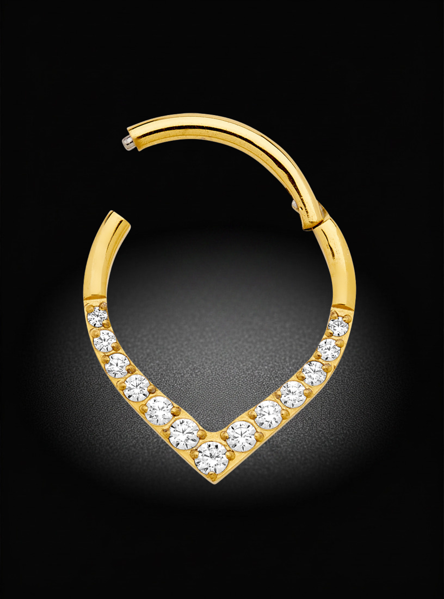 A gold crescent-shaped hoop earring with a V-shaped bottom pavé-set row of clear round gemstones, shown on a black background.