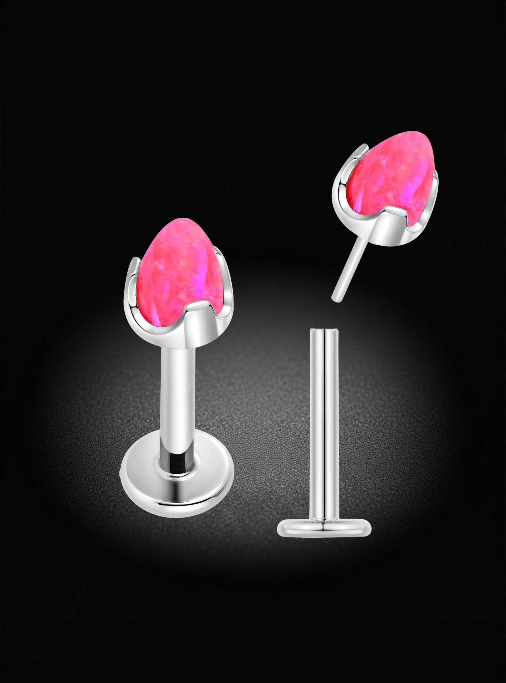 Two silver-toned labret piercing studs with teardrop-shaped pink gemstones, shown on a black background with one stud assembled and the other disassembled to show the post and flat back.